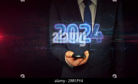 2024 new cyber design concept. Businessman touch the hologram display in hand. Futuristic light neon symbol abstract 3d illustration. Stock Photo