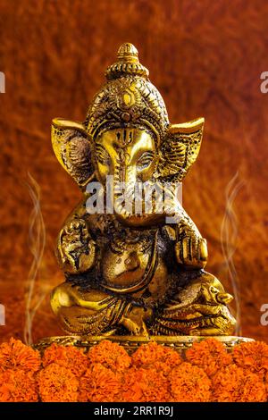 Shot of Hindu God Lord Ganesha during a religious ritual Stock Photo