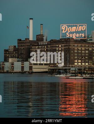 Domino Sugar Factory neon sign at night in Baltimore, Maryland Stock Photo