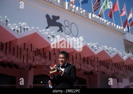 Tony Leung Chiu-wai attends a red carpet for the Golden Lion For Lifetime Achievement Award & ''The Lion's Share: A History Of The Mostra'' at the 80th Venice International Film Festival on September 02, 2023 in Venice, Italy (Photo by Luca Carlino/NurPhoto)0 Stock Photo