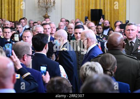 United States President Joe Biden and Captain Larry L. Taylor, United States Army, arrive for the ceremony where the President will award the Medal of Honor to Captain Taylor for conspicuous gallantry, in the East Room of the White House in Washington, DC on Tuesday, September 5, 2023.Credit: Ron Sachs/CNPf /MediaPunch Stock Photo