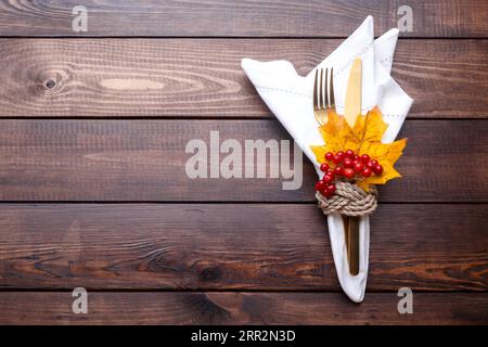 Autumn table setting on old wooden table Thanksgiving or Octoberfest vintage background copy space Stock Photo