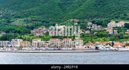 View of Portonovi Marina in the small coastal town of Kumbor in the municipality of Herceg Novi on the Bay of Kotor in Montenegro Stock Photo