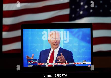 201016 -- WASHINGTON, Oct. 16, 2020 -- Photo taken in Arlington, Virginia, the United States, on Oct. 15, 2020 shows ABC live stream of Democratic presidential nominee Joe Biden s town hall event in Philadelphia, Pennsylvania. U.S. President Donald Trump and his Democratic rival Joe Biden held competing town halls at the same time on Thursday night via different TV networks, attacking each other over issues ranging from the pandemic response, the QAnon conspiracy theory to the Supreme Court expanding. TO GO WITH Spotlight: Trump, Biden attack each other in dueling town halls over coronavirus, Stock Photo