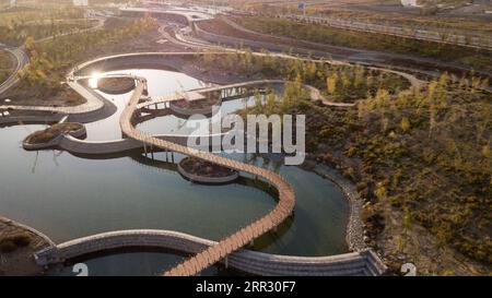 201018 -- CHANGJI, Oct. 18, 2020 -- Aerial photo taken on Oct. 16, 2020 shows a sport park in Changji City, northwest China s Xinjiang Uygur Autonomous Region. An ecological project aiming to build five theme parks around the Xinjiang Grand Theatre is expected to be put into service by the end of this year, as a way to improve the environment along the Toutun River.  CHINA-XINJIANG-CHANGJI-ECOLOGICAL PROJECT CN DingxLei PUBLICATIONxNOTxINxCHN Stock Photo