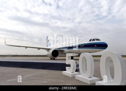 201030 -- BEIJING, Oct. 30, 2020 -- The 500th A320 aircraft assembled at the Airbus Final Assembly Line Asia FALA is pictured in Tianjin, north China, Oct. 29, 2020. Airbus has delivered the 500th A320 family aircraft from FALA in north China s Tianjin Municipality, Airbus China announced Thursday. The A320neo airplane was delivered to China Southern Airlines, a leading airline carrier in the country. Photo by /Xinhua XINHUA PHOTOS OF THE DAY ZhaoxZishuo PUBLICATIONxNOTxINxCHN Stock Photo