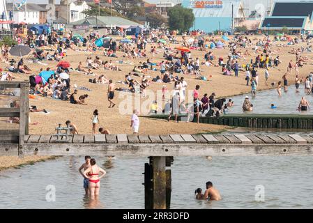 Southend on Sea, Essex, UK. 6th Sep, 2023. A hot day of the current heatwave has attracted visitors to the seaside city of Southend on Sea, with some taking to the beaches and the cool water of the Thames Estuary Stock Photo