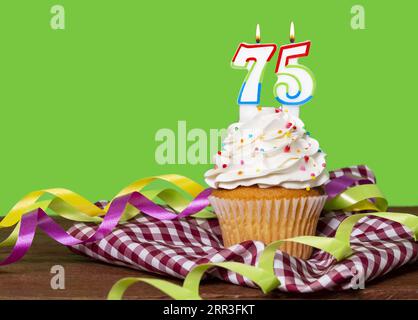 Cupcake With Number For Birthday Or Anniversary Celebration; Number 75. Stock Photo