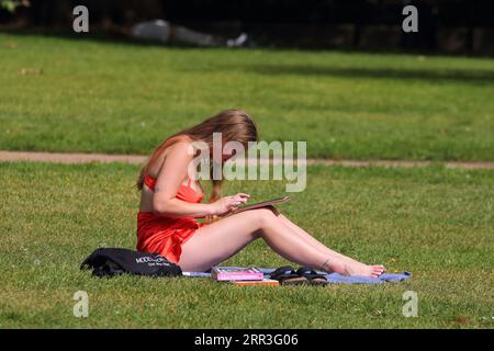 London, United Kingdom. 6th Sep, 2023. UK Weather - Sun worshippers enjoy their time in the parks while temperatures exceed 30 degrees C. Credit: Uwe Deffner/Alamy Live News Stock Photo