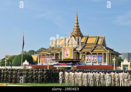 201106 -- PHNOM PENH, Nov. 6, 2020 -- Soldiers take part in the celebration for the 10th anniversary of Cambodian King Norodom Sihamoni s coronation in Phnom Penh, Cambodia, Oct. 29, 2014. Cambodia is time-honored for its rich history and representation of traditions. Phnom Penh, capital of Cambodia, lying at the confluence of the Tonle Sap and Mekong river systems, boasts of its traditional buildings and modern skyscrapers.  CitySketchCAMBODIA-PHNOM PENH LixHong PUBLICATIONxNOTxINxCHN Stock Photo