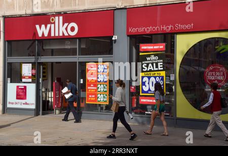 London, UK. 6th Sep, 2023. People walk past the Wilko shop on Kensington High Street as the ailing chain announces it will shut down more than 50 stores. (Credit Image: © Vuk Valcic/SOPA Images via ZUMA Press Wire) EDITORIAL USAGE ONLY! Not for Commercial USAGE! Stock Photo