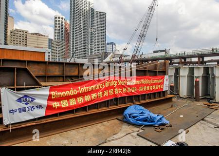 201118 -- MANILA, Nov. 18, 2020 -- Photo taken on Nov. 18, 2020 shows the construction site of the China-funded Binondo-Intramuros Bridge in Manila, the Philippines. The project, started in July 2018, is one of the two China-aid bridges across the Pasig River in the Philippine capital Manila. These bridges are expected to not only improve the capacity and the efficiency of Metro Manila s transportation corridor but also enhance the resilience of the country s road network against natural disasters.  PHILIPPINES-MANILA-CHINA AID-BINONDO-INTRAMUROS BRIDGE ROUELLExUMALI PUBLICATIONxNOTxINxCHN Stock Photo