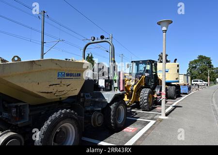 Special machines of yellow colour, designed to make construction and maintenance work on the track and road. Stock Photo