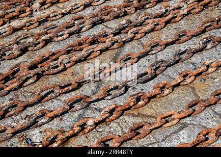rows of rusty anchor chain Stock Photo