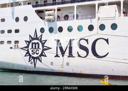 Valletta, Malta - 6 August 2023: Side view of the lower decks of a large cruise ship operated by MSC Cruises Stock Photo