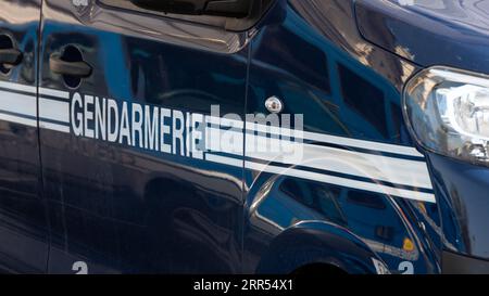 Close-up of a 'Gendarmerie' marking written in French on the side of a patrol and intervention vehicle of the French National Gendarmerie Stock Photo