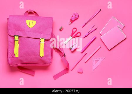 Composition with different stationery and stylish school backpack on pink background Stock Photo