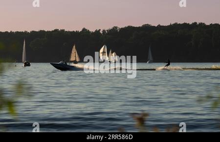 Berlin, Germany. 06th Sep, 2023. A water skier is on the Havel River in the evening. Credit: Paul Zinken/dpa/Alamy Live News Stock Photo