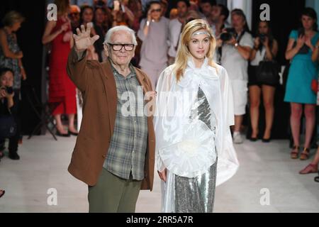 201229 -- BEIJING, Dec. 29, 2020 -- File photo dated July 9, 2016 shows fashion designer Pierre Cardin L waving during a fashion show in Bonnieux, southern France. Pierre Cardin, the French fashion designer famous for his avant-garde style and pioneering business moves across the world, has died at the age of 98, French media reported on Tuesday.  FRANCE-FASHION-PIERRE CARDIN-PASS AWAY LixGenxing PUBLICATIONxNOTxINxCHN Stock Photo