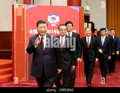 201231 -- BEIJING, Dec. 31, 2020 -- Leaders of the Communist Party of China and the state Xi Jinping, Li Keqiang, Li Zhanshu, Wang Yang, Wang Huning, Zhao Leji, Han Zheng and Wang Qishan attend the New Year gathering held by the National Committee of the Chinese People s Political Consultative Conference CPPCC in Beijing, capital of China, Dec. 31, 2020. The leaders also watched a performance at the gathering.  CHINA-BEIJING-CPPCC-NEW YEAR GATHERING CN YaoxDawei PUBLICATIONxNOTxINxCHN Stock Photo