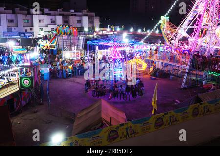 Rajkot, India. 6th September, 2023. People are enjoying various types of rides at Rajkot fair 150 ft ring road. Credit: Nasirkhan Davi/Alamy Live News Stock Photo