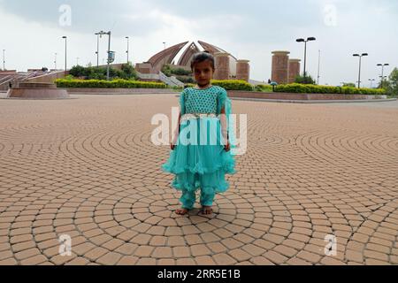 Young girl at the Pakistan Monument in Islamabad Stock Photo