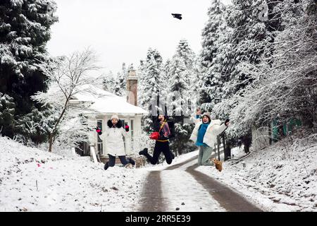 210103 -- BEIJING, Jan. 3, 2021 -- People enjoy themselves at the Fairy Mountain national forest park in Wulong District of Chongqing, southwest China, Jan. 2, 2021.  XINHUA PHOTOS OF THE DAY LiuxChan PUBLICATIONxNOTxINxCHN Stock Photo