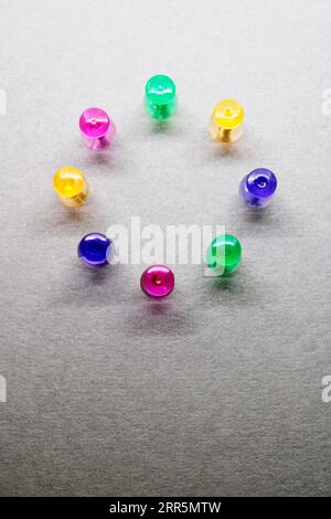 Group of thumbtacks formed in circle Stock Photo