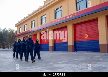 210114 -- MOHE, Jan. 14, 2021 -- Firefighters exercise at the fire station in Beiji Village of Mohe City, northeast China s Heilongjiang Province, Jan. 13, 2021. Firefighters stick to their post and keep training despite the freezing weather in Mohe, the northernmost city in China, where the temperature is often below minus 40 degrees Celsius in winter.  CHINA-HEILONGJIANG-MOHE-WINTER-FIRE FIGHTERSCN XiexJianfei PUBLICATIONxNOTxINxCHN Stock Photo