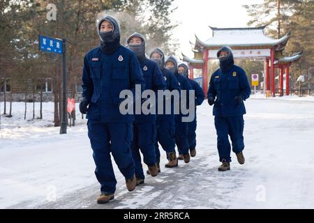 210114 -- MOHE, Jan. 14, 2021 -- Firefighters exercise in Beiji Village of Mohe City, northeast China s Heilongjiang Province, Jan. 13, 2021. Firefighters stick to their post and keep training despite the freezing weather in Mohe, the northernmost city in China, where the temperature is often below minus 40 degrees Celsius in winter.  CHINA-HEILONGJIANG-MOHE-WINTER-FIRE FIGHTERSCN XiexJianfei PUBLICATIONxNOTxINxCHN Stock Photo