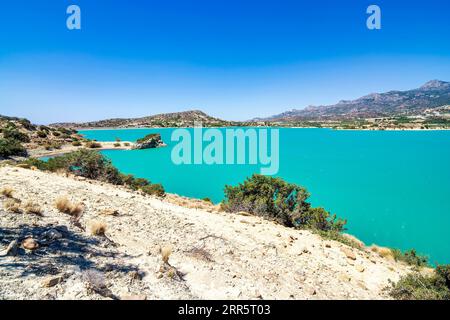 Bramian Lake in Ierapetra, Crete, Greece. The artificial Bramian Lake was built in 1986 to cover the cultivation needs of 30,000 acres of Ierapetra. T Stock Photo