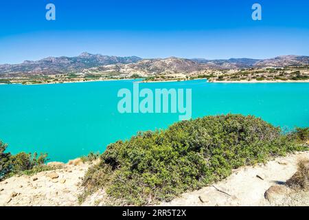 Bramian Lake in Ierapetra, Crete, Greece. The artificial Bramian Lake was built in 1986 to cover the cultivation needs of 30,000 acres of Ierapetra. T Stock Photo