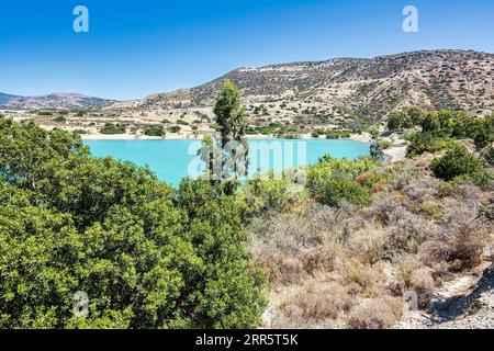 Bramian Lake in Ierapetra, Crete, Greece. The artificial Bramian Lake was built in 1986 to cover the cultivation needs of 30,000 acres of Ierapetra. T Stock Photo