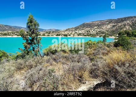 Bramian Lake in Ierapetra, Crete, Greece. The artificial Bramian Lake was built in 1986 to cover the cultivation needs of 30,000 acres of Ierapetra. T Stock Photo