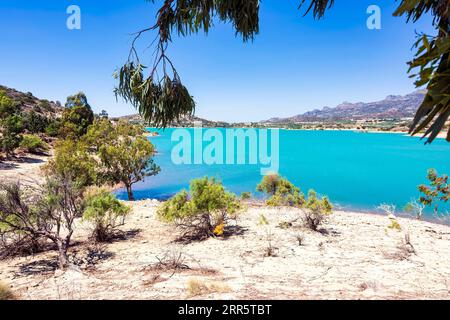 Bramian Lake in Ierapetra, Crete, Greece. The artificial Bramian Lake was built in 1986 to cover the cultivation needs of 30,000 acres of Ierapetra. T Stock Photo