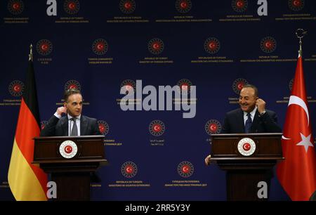 210119 -- ANKARA, Jan. 19, 2021  -- Turkish Foreign Minister Mevlut Cavusoglu R and his German counterpart Heiko Maas L hold a joint press conference in Ankara, Turkey on Jan. 18, 2021. Turkish and German foreign ministers on Monday discussed recent advances between Ankara and Brussels as tensions calm down in the Eastern Mediterranean due to Turkey s gas exploration activities in the disputed waters.  TURKEY-GERMANY-FM-MEETING Xinhua PUBLICATIONxNOTxINxCHN Stock Photo