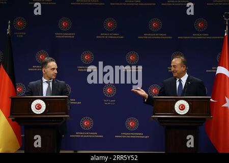 210119 -- ANKARA, Jan. 19, 2021  -- Turkish Foreign Minister Mevlut Cavusoglu R and his German counterpart Heiko Maas L hold a joint press conference in Ankara, Turkey on Jan. 18, 2021. Turkish and German foreign ministers on Monday discussed recent advances between Ankara and Brussels as tensions calm down in the Eastern Mediterranean due to Turkey s gas exploration activities in the disputed waters.  TURKEY-GERMANY-FM-MEETING Xinhua PUBLICATIONxNOTxINxCHN Stock Photo