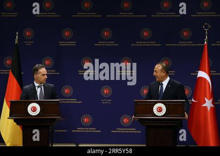 210119 -- ANKARA, Jan. 19, 2021  -- Turkish Foreign Minister Mevlut Cavusoglu R and his German counterpart Heiko Maas L hold a joint press conference in Ankara, Turkey on Jan. 18, 2021. Turkish and German foreign ministers on Monday discussed recent advances between Ankara and Brussels as tensions calm down in the Eastern Mediterranean due to Turkey s gas exploration activities in the disputed waters.  TURKEY-GERMANY-FM-MEETING Xinhua PUBLICATIONxNOTxINxCHN Stock Photo