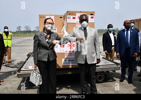 210212 -- BEIJING, Feb. 12, 2021 -- Teodoro Nguema Obiang Mangue R, front, vice president of Equatorial Guinea, and Chinese Ambassador to Equatorial Guinea Qi Mei attend a handover ceremony for COVID-19 vaccines in Malabo, Equatorial Guinea, Feb. 10, 2021. A batch of China-donated Sinopharm COVID-19 vaccines arrived in Malabo, capital of Equatorial Guinea, on Wednesday. Photo by /Xinhua XINHUA PHOTOS OF THE DAY LixBoyuan PUBLICATIONxNOTxINxCHN Stock Photo