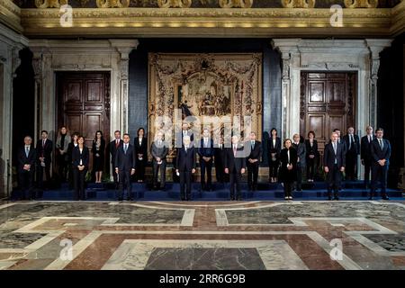 210214 -- BEIJING, Feb. 14, 2021 -- Italian President Sergio Mattarella 4th L, front and Prime Minister Mario Draghi 5th L, front pose for a group photo with other members of the new government at the Quirinale presidential palace in Rome, Italy, Feb. 13, 2021. The Italian government formed by newly-appointed Prime Minister Mario Draghi, who was the former chief of the European Central Bank ECB, was officially sworn in on Saturday.  XINHUA PHOTOS OF THE DAY PoolxviaxXinhua PUBLICATIONxNOTxINxCHN Stock Photo