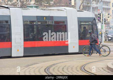 210219 -- VIENNA, Feb. 19, 2021 -- A tram runs on the street in Vienna, Austria, Feb. 19, 2021. Around 574 million passengers traveled by underground, tram and bus in Vienna in 2020, which is 40 percent fewer than in 2019, according to the public transport operator Wiener Linien.  AUSTRIA-VIENNA-PUBLIC TRANSPORTATION-DECREASING GuoxChen PUBLICATIONxNOTxINxCHN Stock Photo