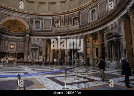 210226 -- ROME, Feb. 26, 2021 -- People visit the Pantheon in Rome, Italy, Feb. 25, 2021. With the easing of coronavirus restrictions, museums and cultural sites reopened from Feb. 1 in most of Italy with new health-monitoring protocols. The only thing missing were the tourists. There were multiple factors behind the low visitor numbers, according to media reports, ranging from economic hardship to health worries to the fact that tickets have to be bought ahead of time online. But the biggest factor was clearly the lack of tourists due to coronavirus fears and international travel restrictions Stock Photo