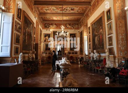 210226 -- ROME, Feb. 26, 2021 -- A woman wearing a face mask visits the Galleria Spada in Rome, Italy, Feb. 25, 2021. With the easing of coronavirus restrictions, museums and cultural sites reopened from Feb. 1 in most of Italy with new health-monitoring protocols. The only thing missing were the tourists. There were multiple factors behind the low visitor numbers, according to media reports, ranging from economic hardship to health worries to the fact that tickets have to be bought ahead of time online. But the biggest factor was clearly the lack of tourists due to coronavirus fears and inter Stock Photo