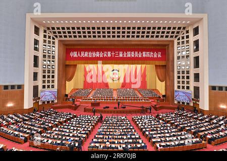 210307 -- BEIJING, March 7, 2021 -- The second plenary meeting of the fourth session of the 13th National Committee of the Chinese People s Political Consultative Conference CPPCC is held at the Great Hall of the People in Beijing, capital of China, March 7, 2021.  TWO SESSIONSCHINA-BEIJING-CPPCC-ANNUAL SESSION-SECOND PLENARY MEETING CN LixXin PUBLICATIONxNOTxINxCHN Stock Photo