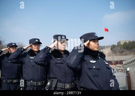 210307 -- BEIJING, March 7, 2021 -- Members of the female police force of Badaling Police Station are seen at the Badaling Great Wall in Beijing, capital of China, March 7, 2021. Established in 2018, the female police force of Badaling Police Station of Yanqing Branch of Beijing Municipal Public Security Bureau consists of 6 members with an average age of 33. In terms of daily work, the policewomen patrol in the world-renowned scenic area to keep order and public security, and help tourists to settle issues. Known for kind, patient and meticulous, the policewomen has become the iconic scenery, Stock Photo