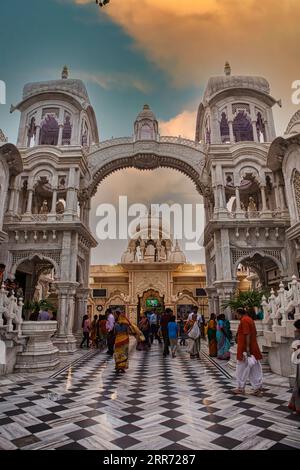 Vrindavan, Uttar Pradesh, October 19th 2019: In evening time, people roaming and enjoying in front of main entrance gate of Sri Krishna-Balaram temple Stock Photo