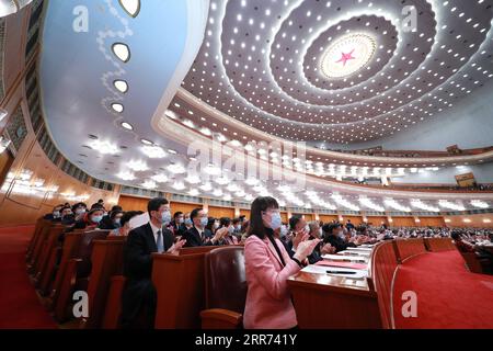 210311 -- BEIJING, March 11, 2021 -- The closing meeting of the fourth session of the 13th National People s Congress NPC is held at the Great Hall of the People in Beijing, capital of China, March 11, 2021.  TWO SESSIONSCHINA-BEIJING-NPC-ANNUAL SESSION-CLOSING MEETING CN PangxXinglei PUBLICATIONxNOTxINxCHN Stock Photo