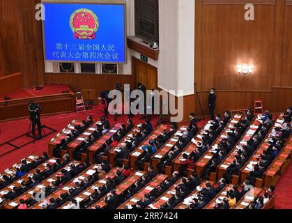 210311 -- BEIJING, March 11, 2021 -- The closing meeting of the fourth session of the 13th National People s Congress NPC is held at the Great Hall of the People in Beijing, capital of China, March 11, 2021.  TWO SESSIONSCHINA-BEIJING-NPC-ANNUAL SESSION-CLOSING MEETING CN ChenxYehua PUBLICATIONxNOTxINxCHN Stock Photo