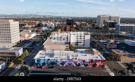 Santa Ana, California, USA - August 12, 2023: Afternoon sunlight shines on the urban core of downtown Santa Ana. Stock Photo