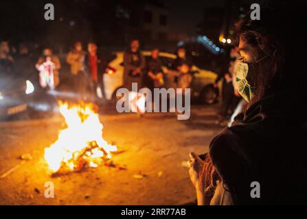 210317 -- TEHRAN, March 17, 2021 -- People gather around a bonfire in the celebrations of the Fire Festival in Tehran, Iran, on March 16, 2021. Fire Festival is celebrated annually by Iranians on the eve of last Wednesday before Nowruz, the Iranian new year, which begins on March 21 this year. Photo by /Xinhua IRAN-TEHRAN-FIRE FESTIVAL AhmadxHalabisaz PUBLICATIONxNOTxINxCHN Stock Photo